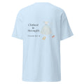 Light Blue | Back view of Clothed in Strength women's faith T-shirt featuring Proverbs 31:25–31, feminine dress artwork.