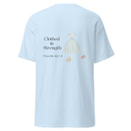 Light Blue | Back view of Clothed in Strength women's faith T-shirt featuring Proverbs 31:25–31, feminine dress artwork.