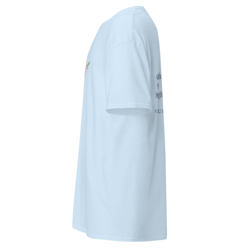 Light Blue | Left side profile of the Clothed in Strength women's faith T-shirt highlighting the left sleeve.