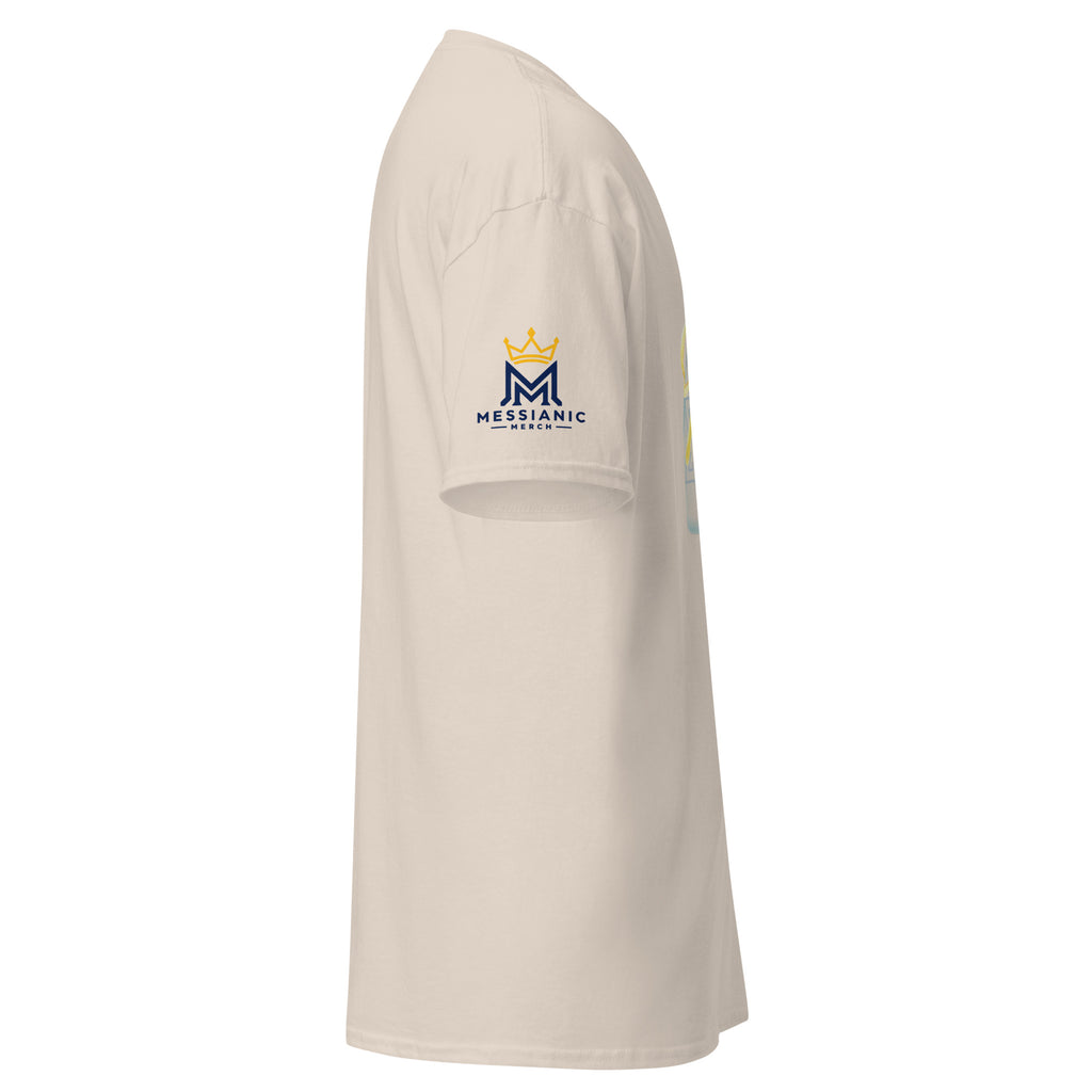 Natural | Right close up of the Shalom Y'all women's T-shirt sleeve and Messianic Merch logo.